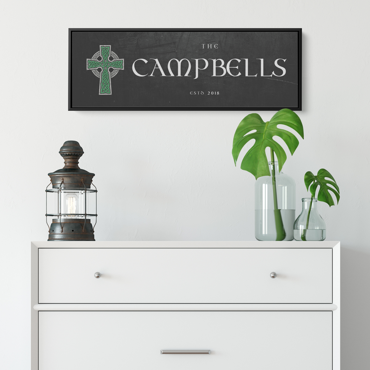 Celtic Cross family name canvas above a white dresser