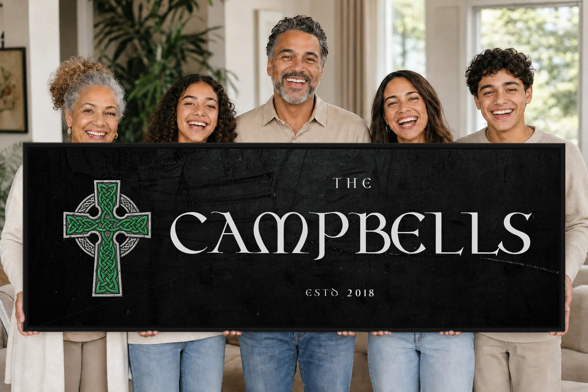 A smiling family holding their personalized Celtic Cross canvas in the living room